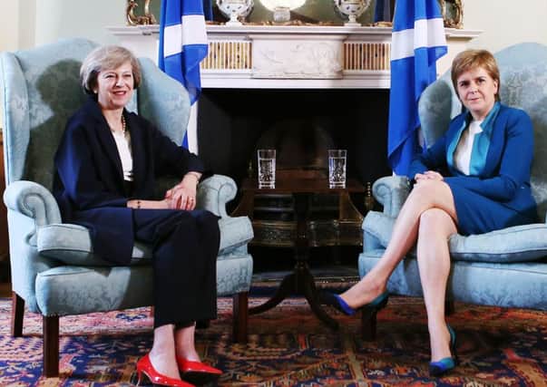 File photo dated 15/07/16 of Prime Minister Theresa May (left) meeting with Nicola Sturgeon at Bute House in Edinburgh