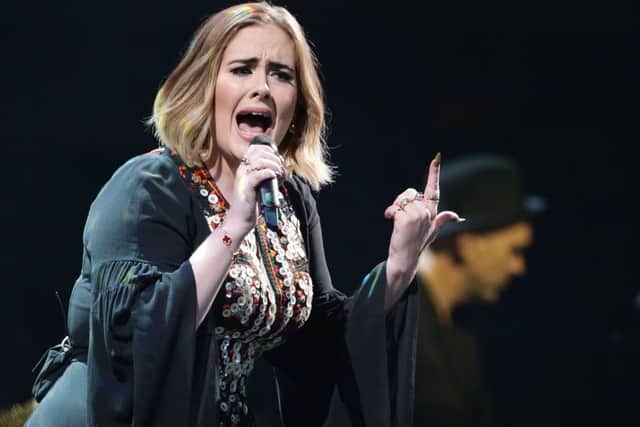 File photo dated 25/6/16 of Adele who has backed survivors of the Grenfell Tower disaster in calling for Theresa May to take urgent action to restore their faith in the inquiry