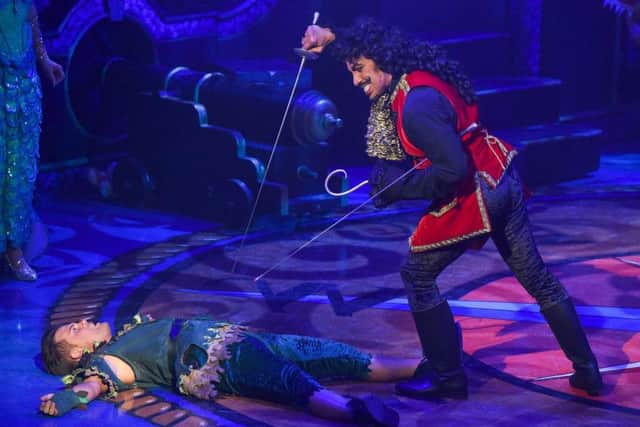 Peter Pan (Mikey Jay-Heath) and Captain Hook (David Bedella) at the Grand Opera House panto performance of Peter Pan, opening on Saturday night (2 Dec).
Photo by Aaron McCracken