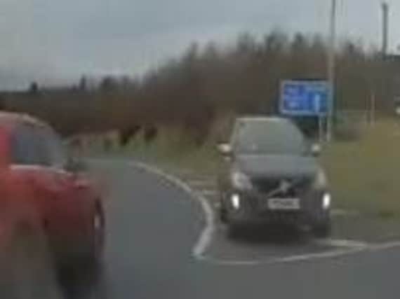 Screenshot of car driving wrong way on motorway