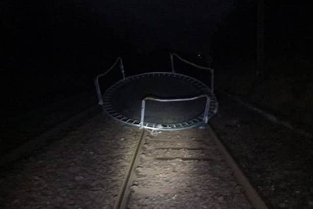 Handout photo issued by ScotRail of a trampoline on the near Patterton, East Renfrewshire which caused disruption to rail services