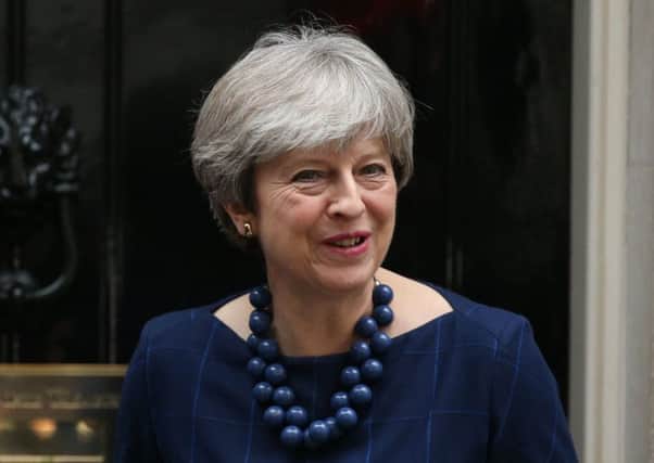 Theresa May who is facing a high-pressure race against time to make progress in Brexit talks amid a deadlock over the Irish border which threatens to drag on until the new year. Photo: Jonathan Brady/PA Wire