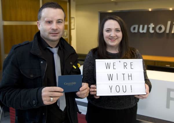 Peter Brunker from Dromore has won the Autoline Insurance and News Letter 'We're With You' competition.  The judging panel were impressed with his community spirit and serial fundraising.  Peter is pictured receiving his prize, a night's stay in Galgorm Resort & Spa, from Autoline's Roisin Cowan.