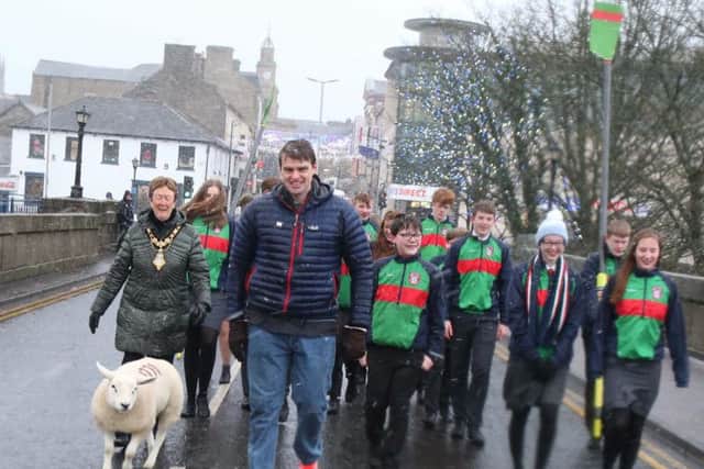 Rower Alan Campbell herds a sheep in Coleraine his home town on being made a Freeman of the Borough. He is assisted by rowers from Coleraine Grammar School, where his rowing career started and the Mayor of the Borough Cllr Joan Baird OBE. PICTURE KEVIN MCAULEY/MCAULEY MULTIMEDIA/CCGBC