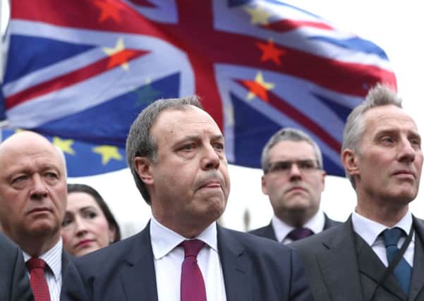Deputy leader Nigel Dodds and fellow Westminster DUP MPs speaking in Victoria Gardens, central London on Brexit last week. Photo: Jonathan Brady/PA Wire