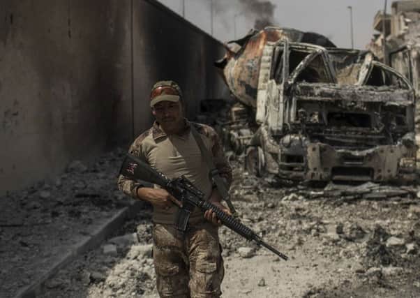 An Iraqi army soldier in Mosul as Iraqi forces continued their advance against Islamic State militants in July of this year
