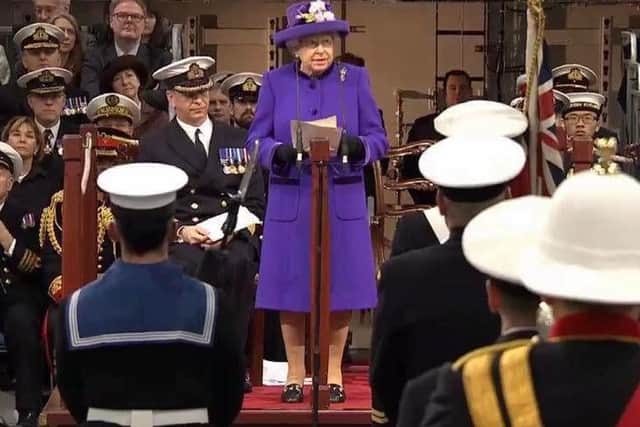The Queen addresses guests at the ceremony. INCT 51-724-CON