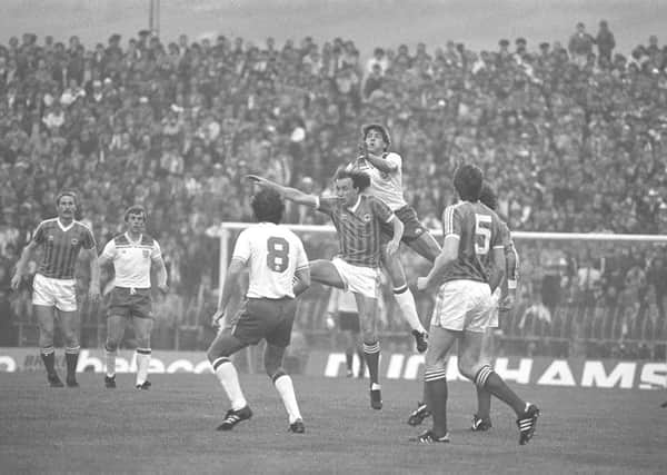 Action from Northern Ireland v England at Windsor Park.