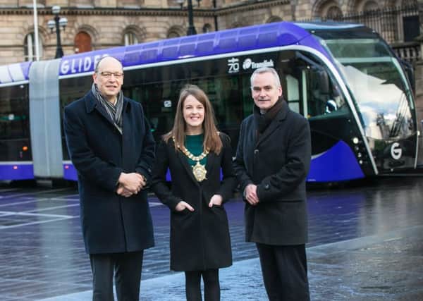 Lord Mayor Nuala McAllister pictured with Peter May, Department for Infrastructure, left, and Translink CEO Chris Conway