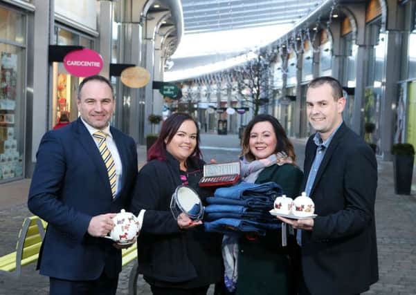 Centre Manager of The OUTLET, Chris Nelmes, announces the arrival of three new stores at the shopping destination, representing an investment of over Â£500,000.  Also pictured are (L-R) store managers Rachael McCann from The Beauty Outlet, Francine Mohan from Jack & Jones and Stephen Mc Cauley from Ulster Weavers. For more information on The OUTLET and its many leading brands visit www.the-outlet.co.uk, facebook.com/outletbanbridge or follow @outletbanbridge on Twitter. Picture by Press Eye.