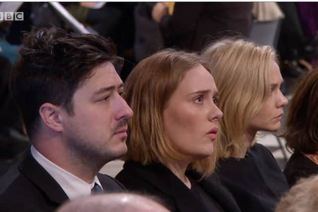 (from left) Marcus Mumford, Adele and Carey Mulligan attending the Grenfell Tower National Memorial Service at St Paul's Cathedral in London, to mark the six-month anniversary of the Grenfell Tower fire. Image BBC / PA