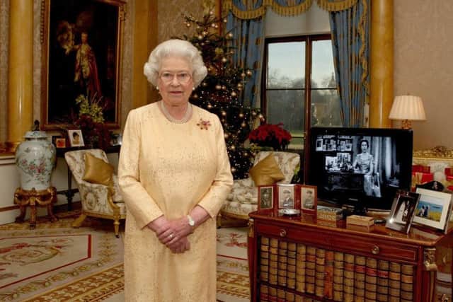 Queen Elizabeth II recording her Christmas Day message to the Commonwealth in the 1844 Room at Buckingham Palace in 2007. PA