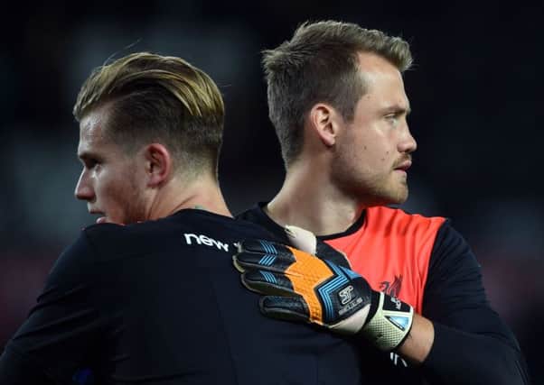Loris Karius (left) is hoping to take over top spot between the Liverpool posts from Simon Mignolet. Pic by PA Sport.