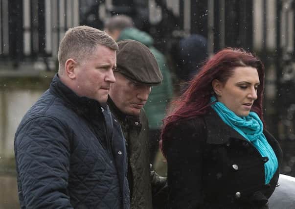 Leader of Britain First, Paul Golding (left) with Deputy leader Jayda Fransen (right) arriving at Belfast Laganside courts. Both have been charged with hate speech in Belfast. Andrew Edge (centre) has not been charged with any offence. Photo: Mark Marlow/PA Wire
