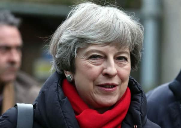 Prime Minister Theresa May pictured after attending a church service near her Maidenhead constituency. Picture date: Sunday December 17, 2017. Photo: Steve Parsons/PA Wire