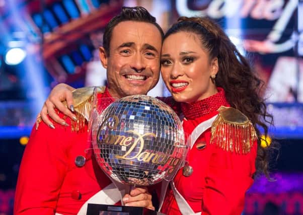 Strictly Come Dancing winners Joe McFadden and Katya Jones with the glitterball trophy after Saturdays final