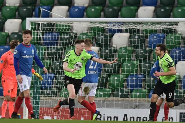 Warrenpoint's Darren Murray wheels away in celebration having found the net at Windsor Park. 
Photo Charles McQuillan/Pacemaker