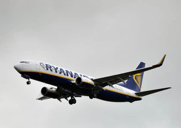 File ,photo dated 29/05/14 of a Ryanair Boeing 737-8AS approaching Stansted Airport, Essex. Ryanair pilots have suspended a pre-Christmas one-day strike, union bosses have announced.  Photo: Nick Ansell/PA Wire