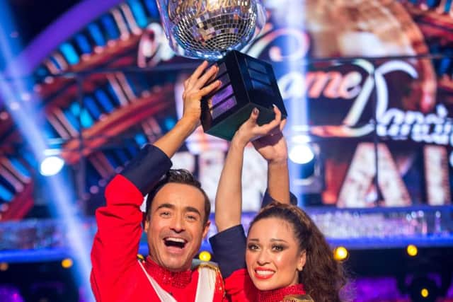 Winners of the BBC 1 show, Strictly Come Dancing, Katya Jones and Joe McFadden with the glitterball trophy