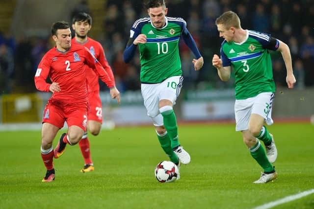Lafferty (centre) in action for Northern Ireland