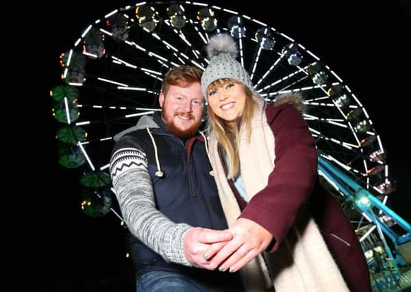 Chris Hamill from Kells, proposed to his girlfriend Rachel McLean from Cabragh, Co Tyrone on top of the Big Wheel at the Enchanted Winter Garden in Antrim Castle Gardens on Friday night.
PICTURE BY STEPHEN DAVISON