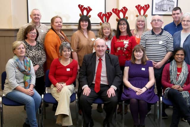 Siobhan Bailie and Sandra McConnell along with members of the Lisburn Fibromyalgia Support Group met with Alderman William Leathem (seated centre), who is raising awareness of Fibromyalgia and ME.