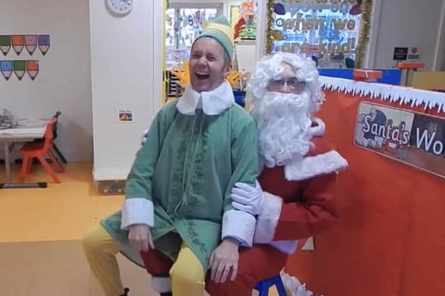Buddy the elf, better known as Principal Geoffrey Cherry, was delighted to meet Santa at Pond Park PS.