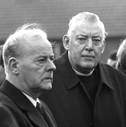 Unionist leaders Rev Ian Paisley and Jim Molyneaux pictured at the funeral of UDA leader John McMichael on 26th December 1987. Photo: Pacemaker.
