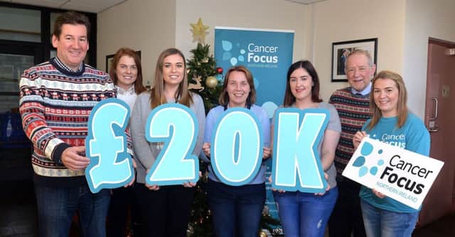 Left to right are: Irwins Bakery staff, David Holmes, Ruth Sloan, Caragh Mullan, Karen Nixon and Rachel Campbell are joined by Irwins Bakery executive chairman, Brian Irwin, and Cancer Focus NI corporate fundraising manager, Rosie Forsythe