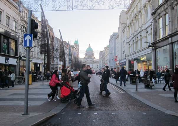 Donegall Place from the Castle Street/Royal Avenue junction in Belfast city centre during Boxing Day shopping