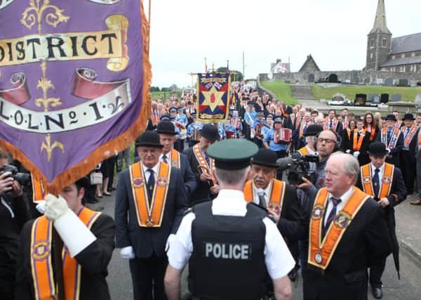 The annual Drumcree parade was again prevented from walking down the Garvaghy road on their return to Carlton Street Orange Hall in July 2017. Now legal tensions are also arising in Scotland regarding Orange parades. 
Photo Matt Bohill/Pacemaker Press