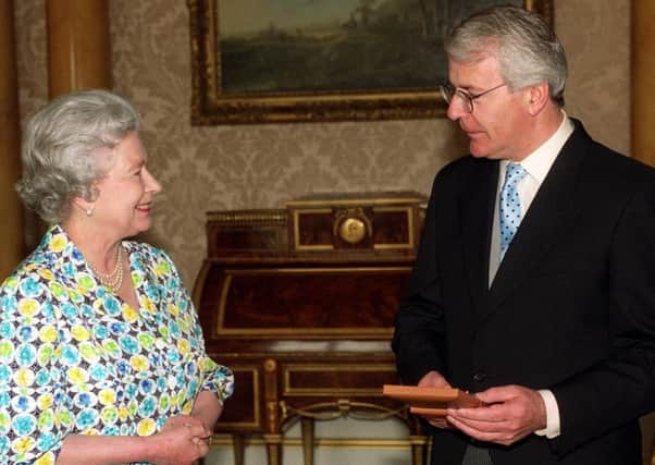 The Queen had asked prime minister John Major in 1992 to consider arrangements by which she could pay the equivalent of income tax on her private income