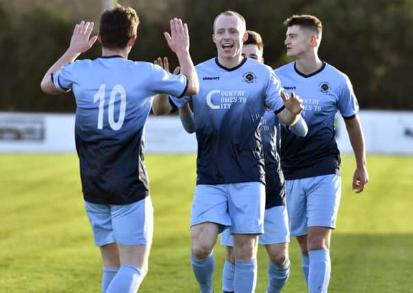 Institute's Dean Curry celebrates after scoring the opening goal of their match against Limavady United. DER0118-101KM