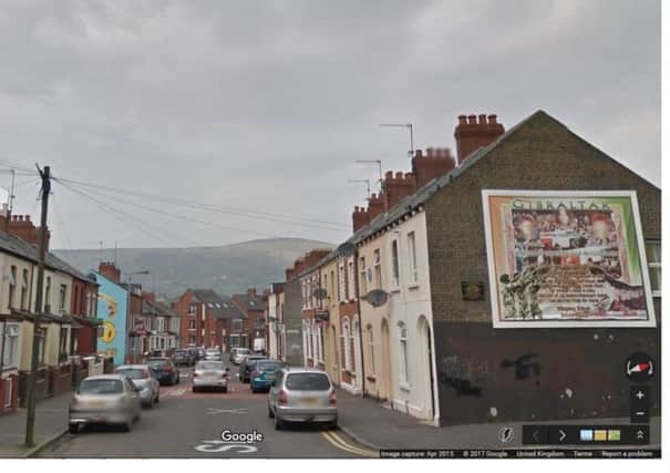 View along Cavendish Street, Belfast , with an IRA mural on a gable wall. Image: Google
