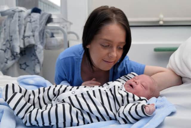 New Year's Day baby Mason with mum Georgina Devine who was born at 4.53am and weighed 6 pound 12 1/2 ounces  at the Royal Victoria Hospital in Belfast. 
Pic Colm Lenaghan/Pacemaker