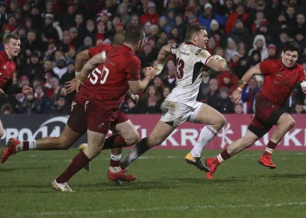 Darren Cave races clear to score Ulster's first try against Munster