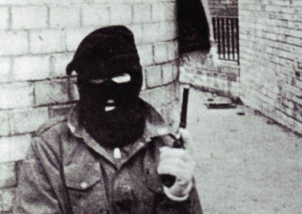 Provisional IRA members pictured in the Whiterock area of west Belfast  in the mid-1980s