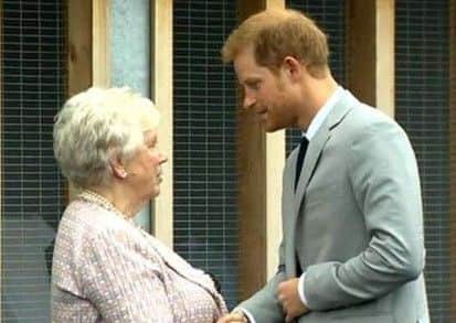 Joan Christie meets Prince Harry during his visit to Ballymena last year