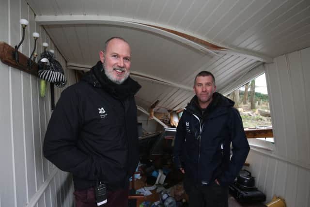 Andrew Upton and Barry Kelly from National Trust Mount Stewart standing inside the Shepherds hut that was destroyed 

Picture by Matt Mackey / Presseye.com