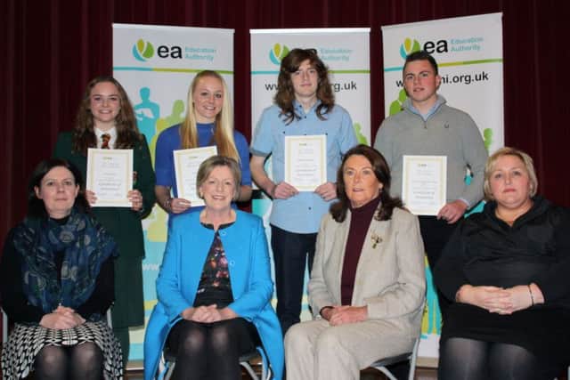 Pictured at the Education Authority's third annual 'Celebration of Full Attendance' event are FR L-R Principal Mary McHenry, EA Director of CYPS Dr Clare Mangan, Chair of CYPS Cttee and EA Board Member Pat Carville and Nicola Topping EA CYPS. BR L-R Victoria Hunter and Alexandra Hunter Friends' School, Aaron Donnell Saintfield High School and Scott Hagan Our Lady & St Patrick's College, Knock.