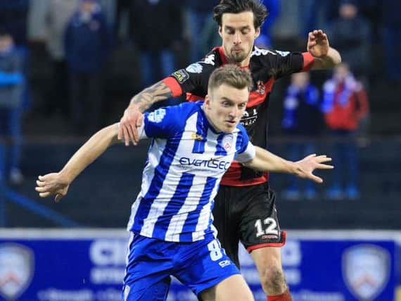 Martin Smith was on target for Coleraine in their 7-0 win over Lisburn Distillery in the Irish Cup.