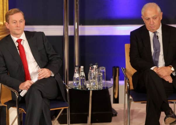 Peter Sutherland (right) with former taoiseach Enda Kenny