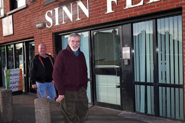 Sinn Fein President Gerry Adams leaving the party's headquarters on the Falls Road in Belfast where a meeting with West Tyrone MP Barry McElduff is taking place.