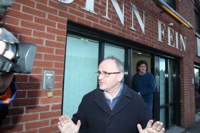 Barry McElduff pictured leaving the party's office on the falls Road in west Belfast following a meeting where he was suspended for three month