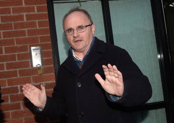 Sinn Fein MP Barry McElduff leaves party HQ on the Falls Road, Belfast