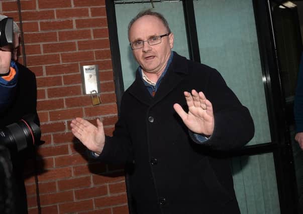 Barry McElduff leaves Sinn Fein headquarters earlier this week after the party suspended him on full pay for three months