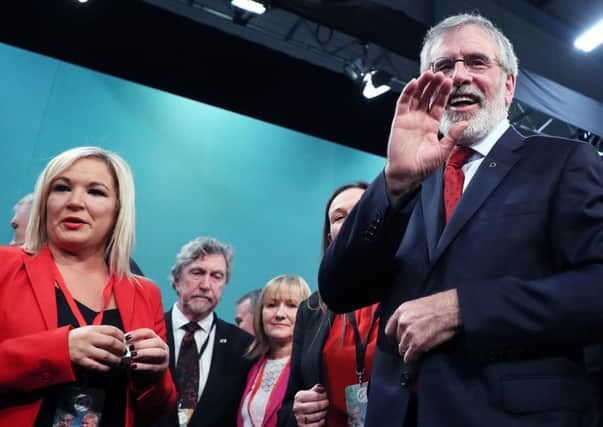 Sinn Fein President Gerry Adams with Michelle O'Neill following his speech at the 2017 Sinn Fein ard fheis in Dublin. Picture :: Brian Lawless/PA Wire