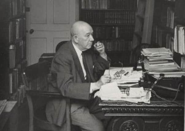 Dr Alfred Wiener at his desk in 1953