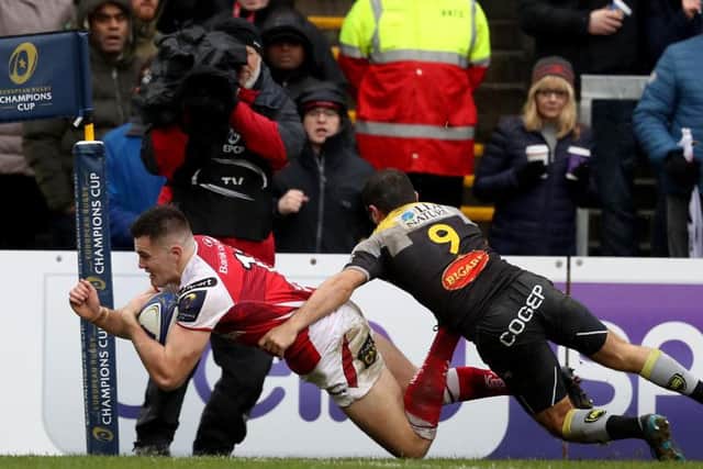 Jacob Stockdale goes over for a try against La Rochelle