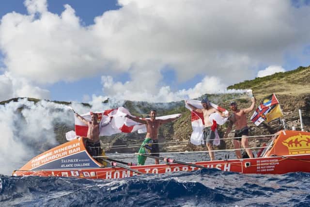 George McAlpin, Gareth Barton, Alistair Cooper and Luke Baker celebrate on their arrival in Antigua